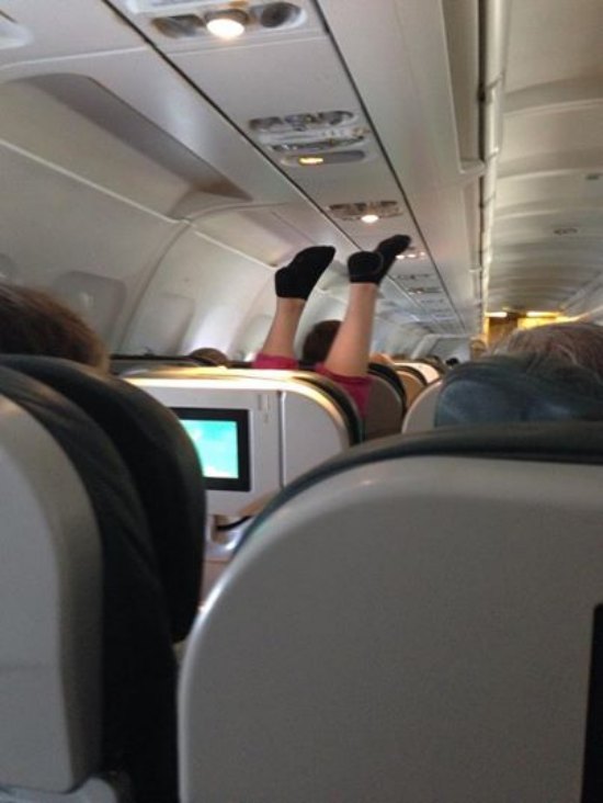 feet airplane seat weird upside down